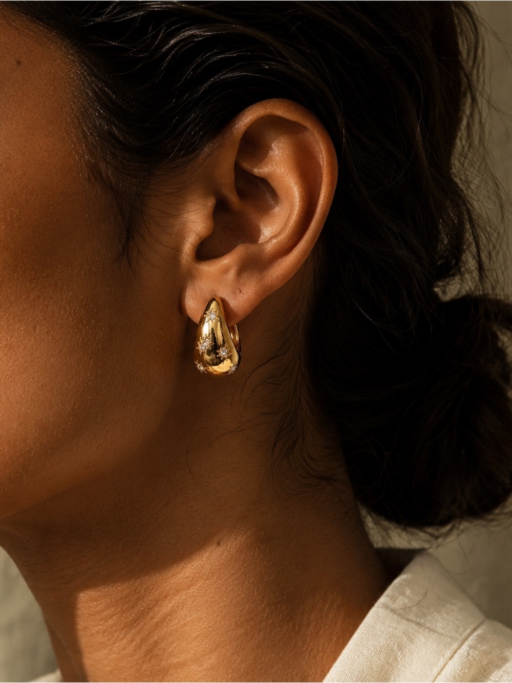 Gold Tone Chunky Crystal Starburst Huggie Hoop Earrings